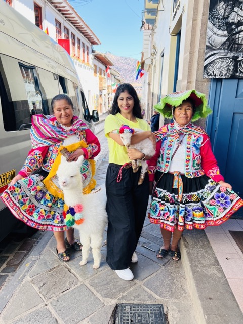 With Incan natives and a cute Alapaca <3
